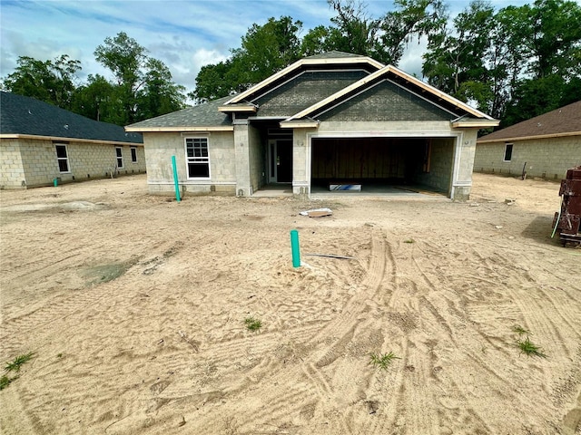 3143 NE 46th Ave, Ocala, FL 34470 - property in mid-construction with a garage, driveway, and concrete block siding