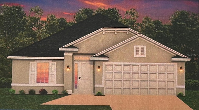 3143 NE 46th Ave, Ocala, FL 34470 - view of front of home with stucco siding, a garage, and concrete driveway