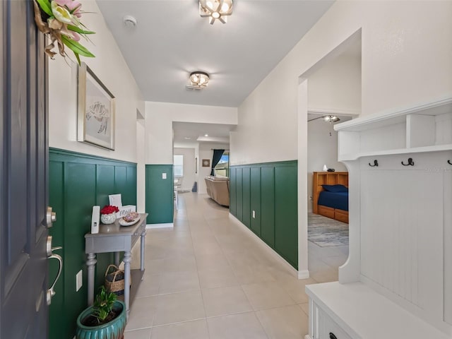 7206 SW 60th Ln, Ocala, FL 34474 - mudroom with wainscoting and light tile patterned flooring