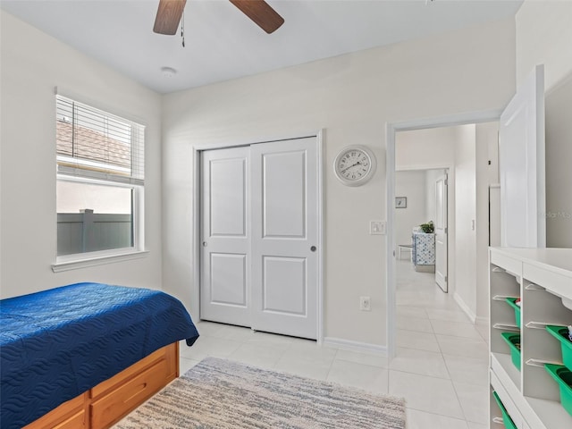 7206 SW 60th Ln, Ocala, FL 34474 - bedroom featuring light tile patterned flooring, ceiling fan, and baseboards