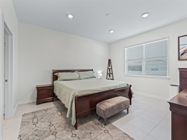 7206 SW 60th Ln, Ocala, FL 34474 - bedroom with light tile patterned floors, baseboards, and recessed lighting