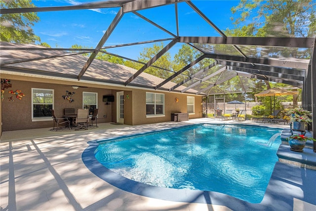200 SE 145th St, Summerfield, FL 34491 - swimming pool featuring a patio, ceiling fan, and glass enclosure