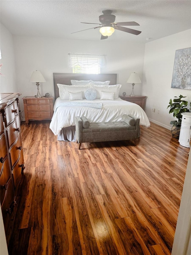 5263 NW 62nd Ave NW, Ocala, FL 34482 - bedroom featuring wood finished floors, ceiling fan, and baseboards