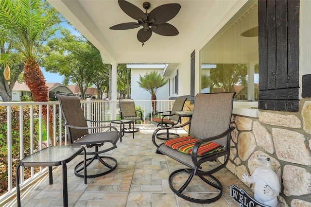 8785 SW 93rd Ln Unit C, Ocala, FL 34481 - view of patio featuring ceiling fan