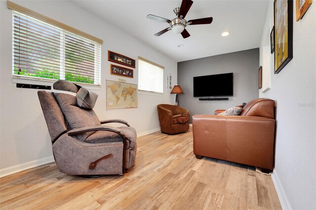 8785 SW 93rd Ln Unit C, Ocala, FL 34481 - living area featuring wood finished floors, baseboards, a ceiling fan, and recessed lighting
