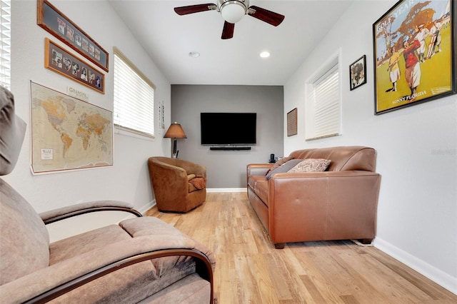 8785 SW 93rd Ln Unit C, Ocala, FL 34481 - living area featuring light wood finished floors, ceiling fan, recessed lighting, and baseboards
