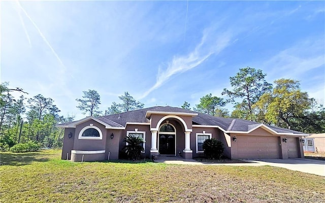 4710 W Mustang Blvd, Beverly Hills, FL 34465 - ranch-style house featuring an attached garage, stucco siding, a front yard, and driveway