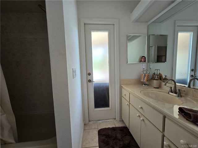4710 W Mustang Blvd, Beverly Hills, FL 34465 - full bath featuring vanity, tile patterned flooring, and curtained shower