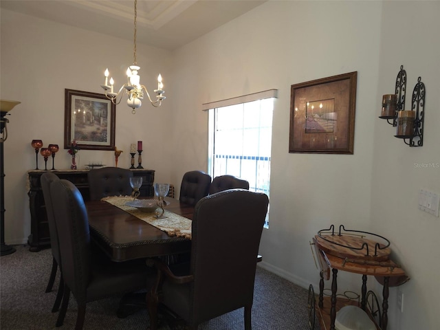 4710 W Mustang Blvd, Beverly Hills, FL 34465 - carpeted dining area featuring a chandelier and baseboards