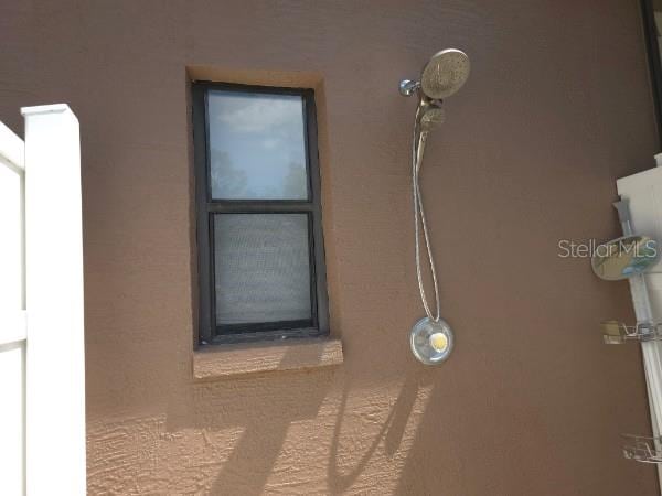 4710 W Mustang Blvd, Beverly Hills, FL 34465 - exterior view of stucco siding
