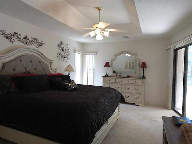 4710 W Mustang Blvd, Beverly Hills, FL 34465 - bedroom with light colored carpet, a ceiling fan, and access to exterior
