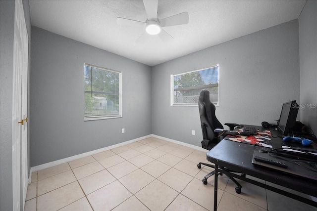 219 Marion Oaks Ln, Ocala, FL 34473 - office area with light tile patterned floors, ceiling fan, and a textured ceiling