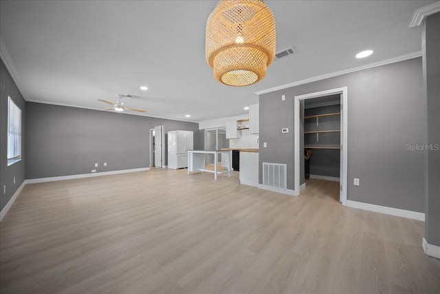 219 Marion Oaks Ln, Ocala, FL 34473 - unfurnished living room featuring ornamental molding, light wood finished floors, baseboards, recessed lighting, and a ceiling fan