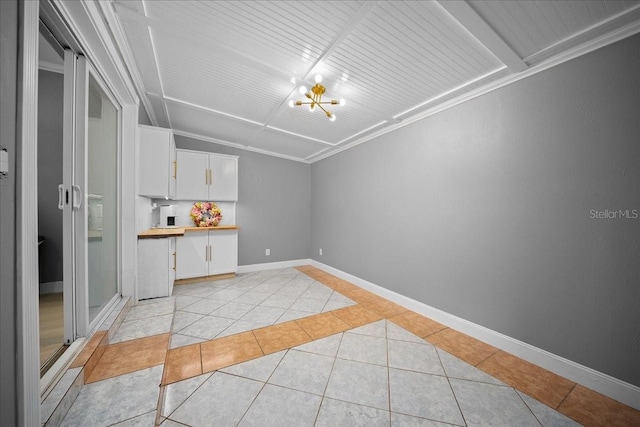 219 Marion Oaks Ln, Ocala, FL 34473 - unfurnished room featuring light tile patterned flooring, a chandelier, and baseboards