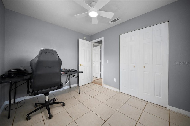219 Marion Oaks Ln, Ocala, FL 34473 - home office featuring a ceiling fan, baseboards, and light tile patterned floors