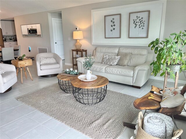 5667 SW 92nd Pl, Ocala, FL 34476 - tiled living area featuring baseboards