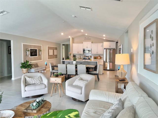 5667 SW 92nd Pl, Ocala, FL 34476 - living area with light tile patterned floors, lofted ceiling, and recessed lighting