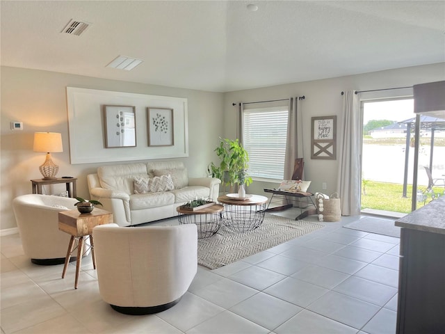 5667 SW 92nd Pl, Ocala, FL 34476 - living area featuring light tile patterned flooring and baseboards