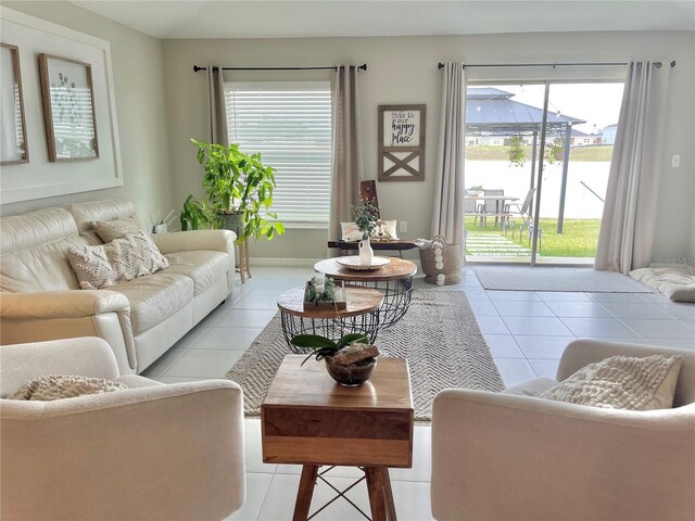 5667 SW 92nd Pl, Ocala, FL 34476 - living room featuring light tile patterned flooring