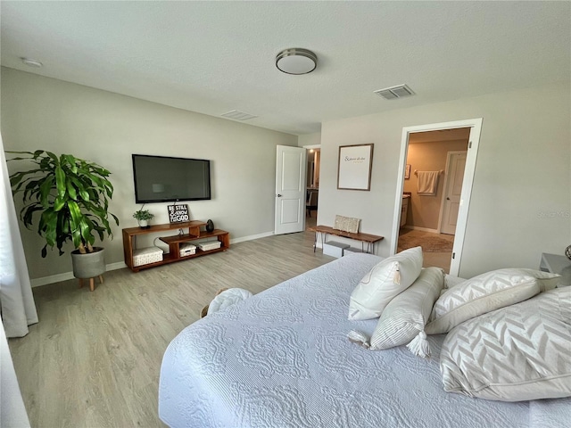 5667 SW 92nd Pl, Ocala, FL 34476 - bedroom with wood finished floors and baseboards