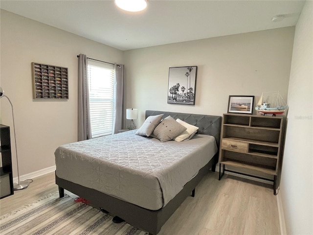 5667 SW 92nd Pl, Ocala, FL 34476 - bedroom featuring light wood-style floors and baseboards