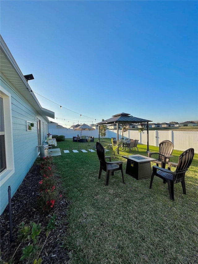 5667 SW 92nd Pl, Ocala, FL 34476 - view of yard featuring a gazebo and a fire pit