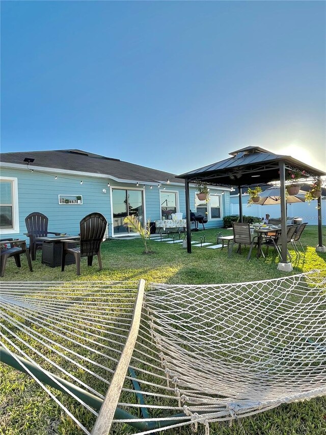 5667 SW 92nd Pl, Ocala, FL 34476 - view of green lawn with a gazebo