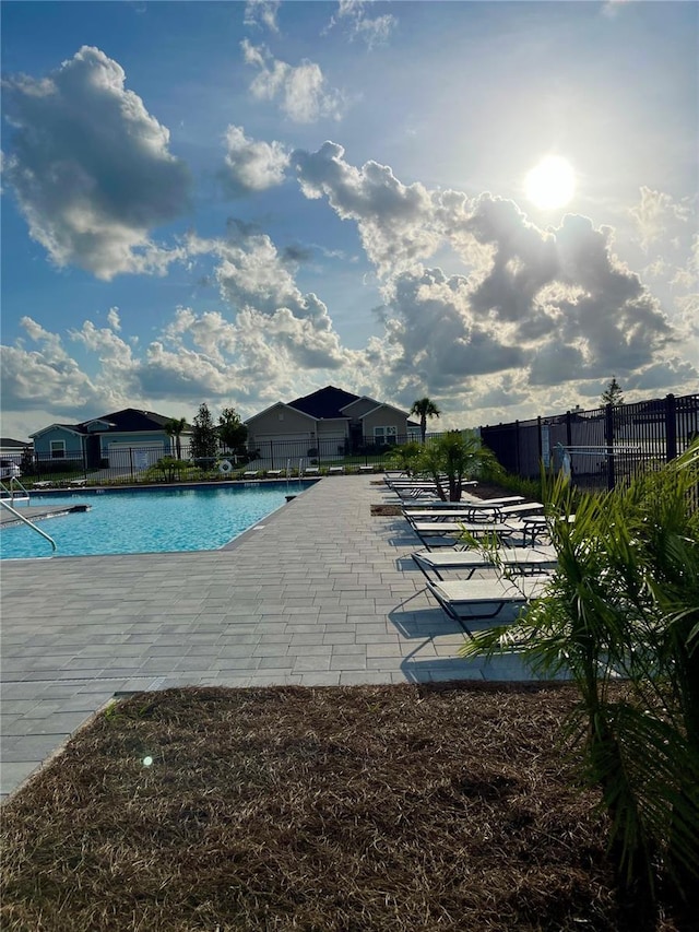 5667 SW 92nd Pl, Ocala, FL 34476 - community pool with a patio