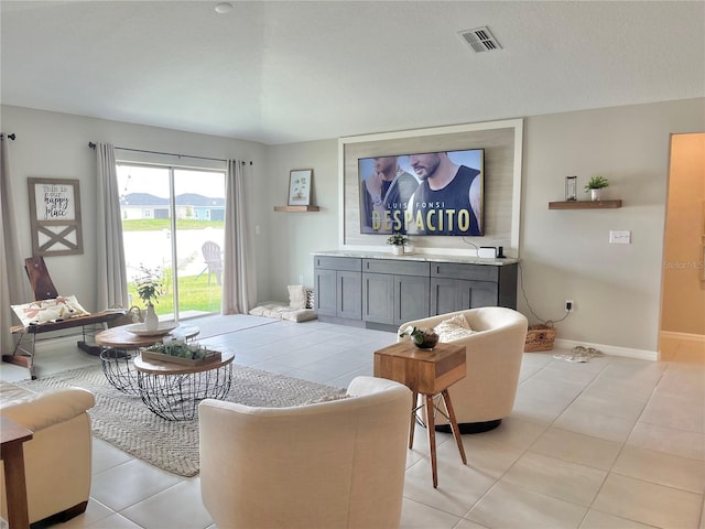 5667 SW 92nd Pl, Ocala, FL 34476 - living area featuring light tile patterned floors and baseboards
