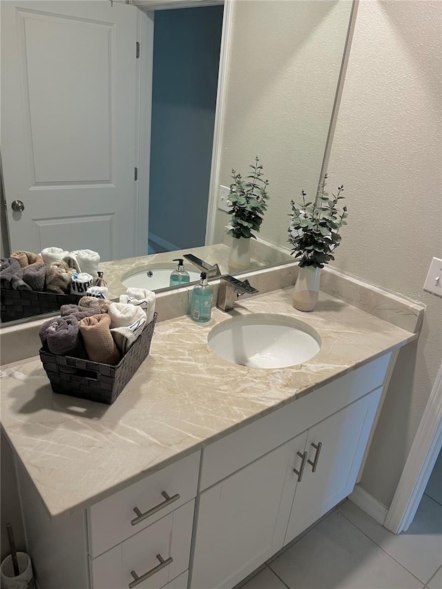5667 SW 92nd Pl, Ocala, FL 34476 - bathroom featuring vanity and tile patterned floors