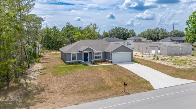 400 Marion Oaks Crse, Ocala, FL 34473 - ranch-style home with driveway, a garage, and stucco siding