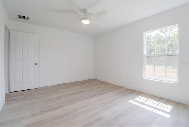 400 Marion Oaks Crse, Ocala, FL 34473 - empty room with light wood finished floors, baseboards, and ceiling fan