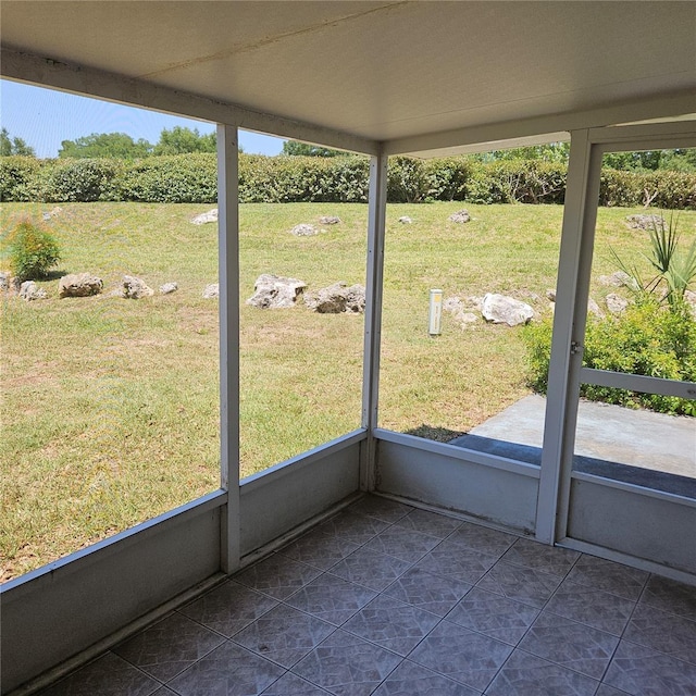 8635 SW 95th St Unit G, Ocala, FL 34481 - unfurnished sunroom featuring healthy amount of natural light
