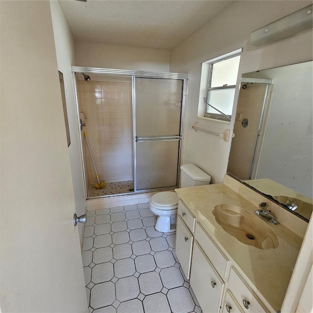 8635 SW 95th St Unit G, Ocala, FL 34481 - full bathroom with vanity, a shower stall, and toilet