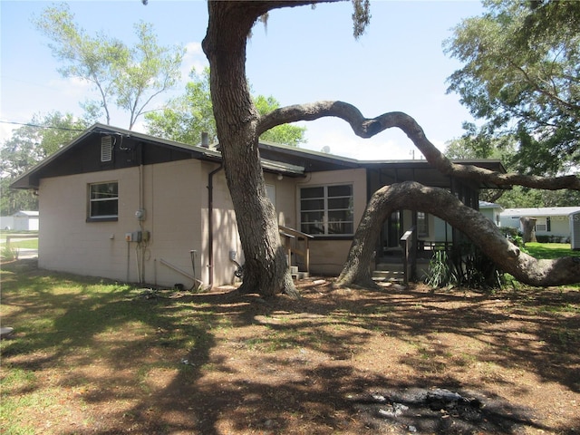 1675 SE 190th Ave, Silver Springs, FL 34488 - back of house with concrete block siding