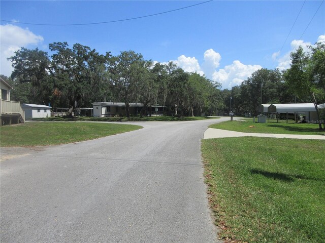 1675 SE 190th Ave, Silver Springs, FL 34488 - view of asphalt street with view of wooded area