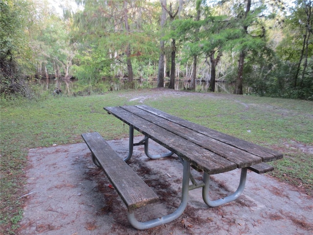 1675 SE 190th Ave, Silver Springs, FL 34488 - view of community featuring a yard and a forest view