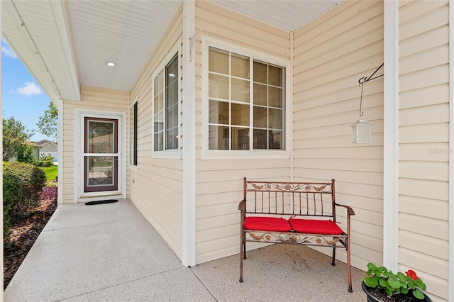 9408 SE 132nd Loop, Summerfield, FL 34491 - view of exterior entry with a porch