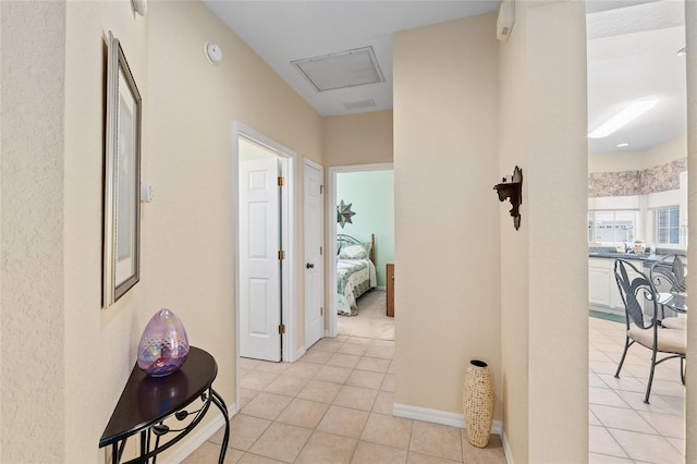 9408 SE 132nd Loop, Summerfield, FL 34491 - corridor with light tile patterned floors