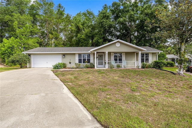 8137 SW 117th Loop, Ocala, FL 34481 - single story home featuring covered porch, a garage, concrete driveway, and a front yard