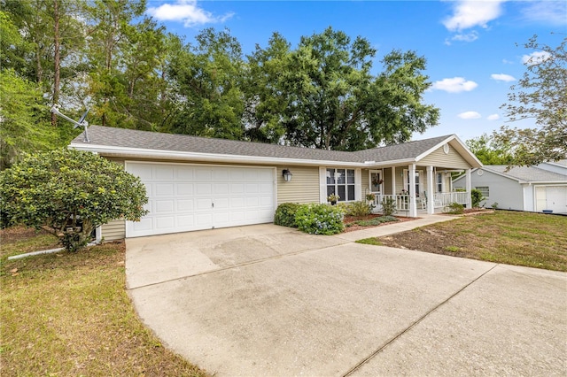 8137 SW 117th Loop, Ocala, FL 34481 - single story home with a porch, driveway, a garage, and a front lawn