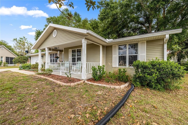 8137 SW 117th Loop, Ocala, FL 34481 - single story home featuring a porch