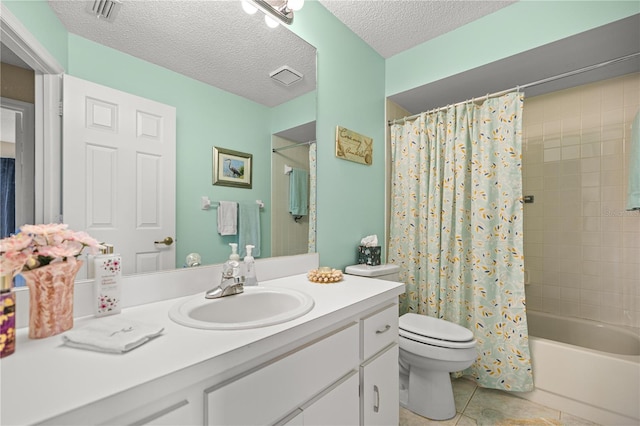 8137 SW 117th Loop, Ocala, FL 34481 - full bath with toilet, vanity, shower / bath combo, tile patterned floors, and a textured ceiling