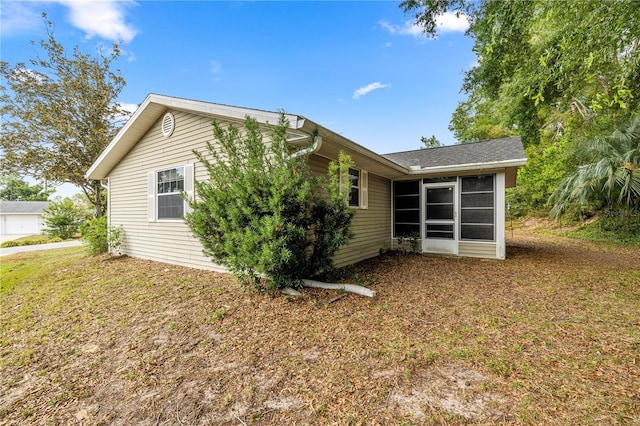 8137 SW 117th Loop, Ocala, FL 34481 - back of property featuring a sunroom