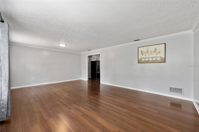 1812 SE 38th Ave, Ocala, FL 34471 - spare room with dark wood-style flooring, a textured ceiling, crown molding, and baseboards