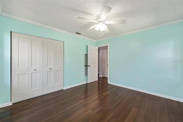 1812 SE 38th Ave, Ocala, FL 34471 - unfurnished bedroom with wood finished floors, a closet, a textured ceiling, baseboards, and ornamental molding