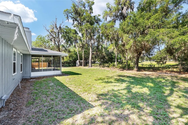 1812 SE 38th Ave, Ocala, FL 34471 - view of green lawn featuring a sunroom