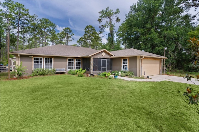 14330 SW 79th Ter, Ocala, FL 34473 - ranch-style house featuring stucco siding, an attached garage, a front lawn, and driveway