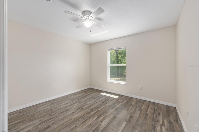 5425 Pecan Rd, Ocala, FL 34472 - spare room featuring wood finished floors, baseboards, and ceiling fan