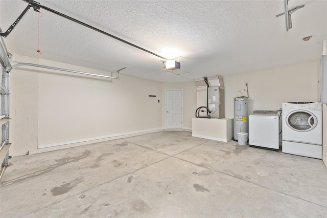 5425 Pecan Rd, Ocala, FL 34472 - garage featuring washer and dryer, water heater, heating unit, and a garage door opener